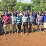 Group photo of Mlimani Sumawe Secondary School staff and students during 2025 Chromebook handover by Powering Potential