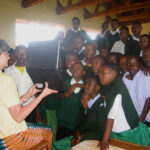 Janice Lathen shows Banjika Secondary students a computer in 2006.